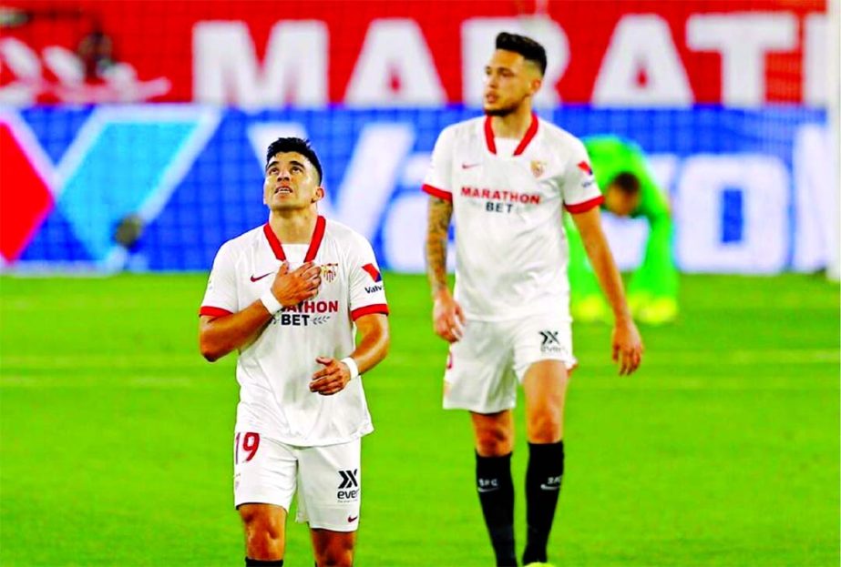 Sevilla's Marcos Acuna celebrates scoring their first goal against Celta Vigo during the Spanish La Liga on Monday.