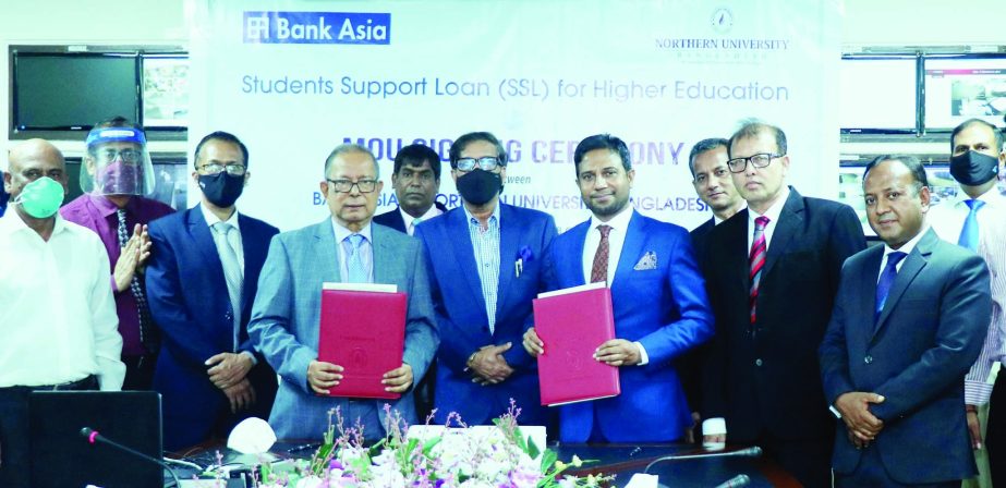 Prof. Dr. Anwar Hossain, Vice Chancellor of Northern University Bangladesh (NUB) and Mohammad Ziaul Hasan Molla, DMD of Bank Asia Limited, pose for photo after signing an agreement at NUB office in the capital recently. Under the deal, the bank will provi