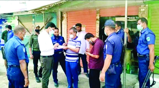 A mobile court led by Upazilla Nirbahi officer Obhishekh Das in Muradnagar upazilla of Cumilla district fines various business shops and persons for defying the health guidelines during the countrywide lockdown on Wednesday.