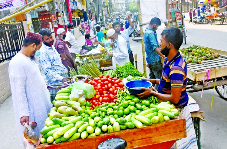 Brinjals and cucumbers kept on a van for sale at the Laxmi Bazar in the capital on Friday. Prices of most vegetables have doubled in the city's kitchen markets in a week due to supply crunch.