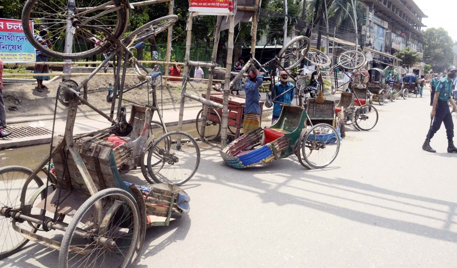 Police overturn battery-run auto-rickshaws during lockdown on Saturday. The snap was taken from in front of Naya Bazar Park in the city on Saturday.