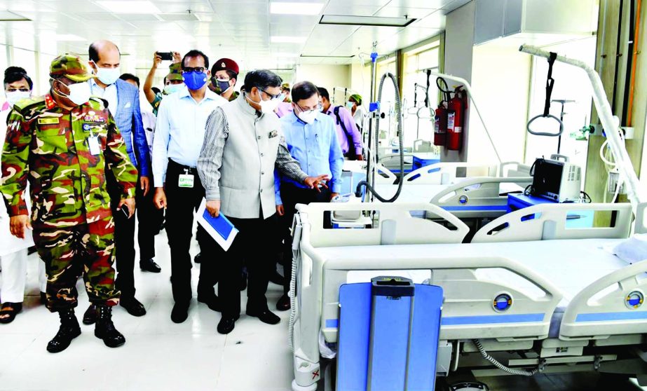 Health Minister Zahid Maleque inspects DNCC’s dedicated Covid-19 Hospital at Mohakhali in the capital on Sunday following its formal inauguration.