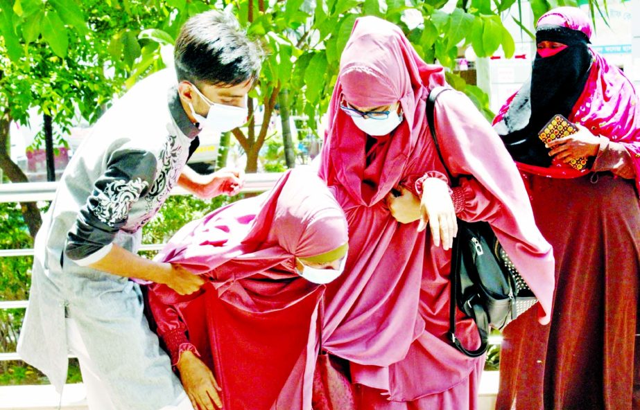 A patient suffering from respiratory problems was taken to Dhaka Medical College Hospital on Tuesday.