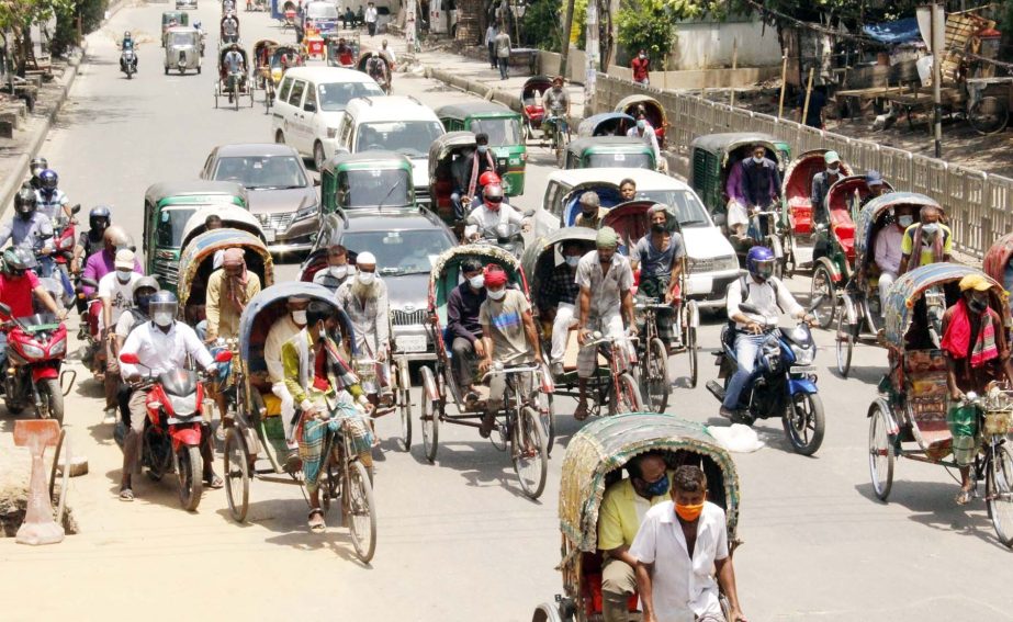 A traffic congestion seen in front of GPO in the city on Tuesday due to police check-post set up to verify movement pass or identity card of the commoners.