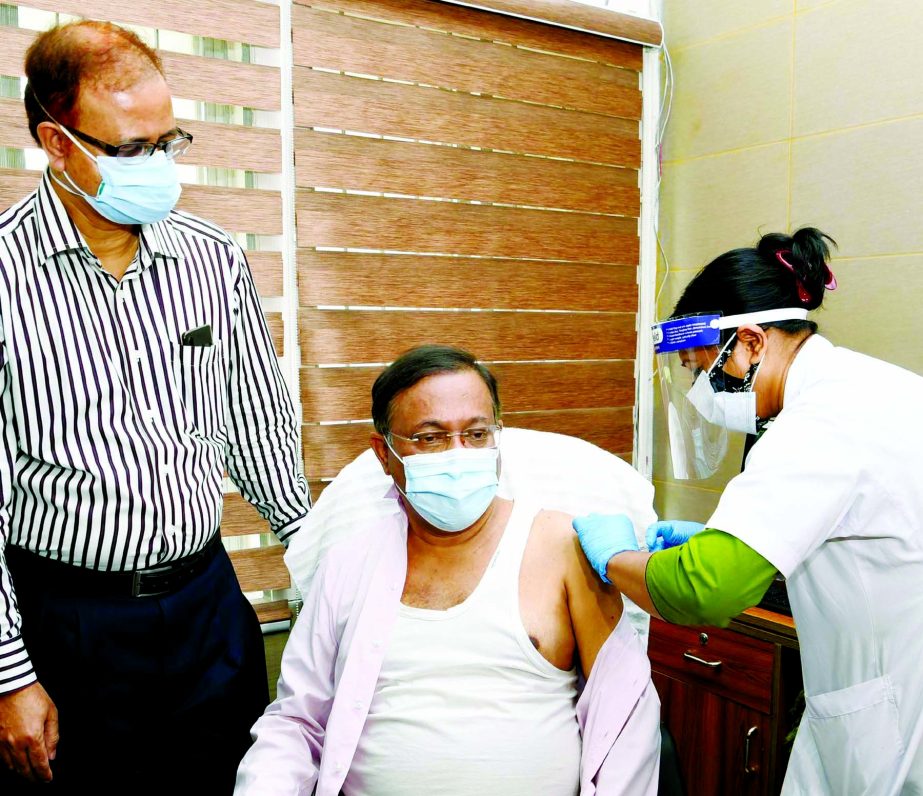 Information and Broadcasting Minister Dr. Hasan Mahmud receives second dose of Covid-19 vaccine at Bangladesh Secretariat Clinic on Wednesday.