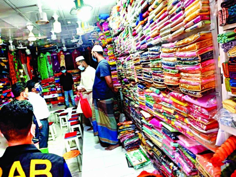 Mobile Court of RAB-10 imposes fine on 8 persons and 14 shops in the city's Lalbagh on Thursday for not following health guidelines.