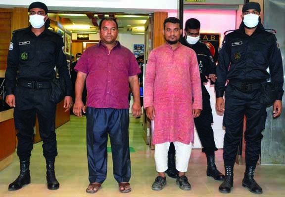 RAB detains two accused in Armanitola fire incident from the city's Uttara and Bogura. The snap was taken from RAB Media Center in the city on Monday.