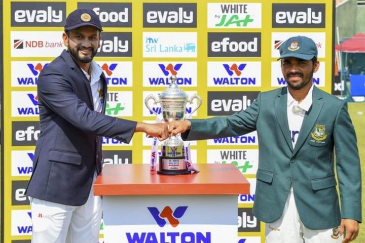 Sri Lanka Cricket team captain Dimuth Karunaratne (left) and Bangladesh Test team captain Mominul Haque pose for a photo in Sri Lanka recently.