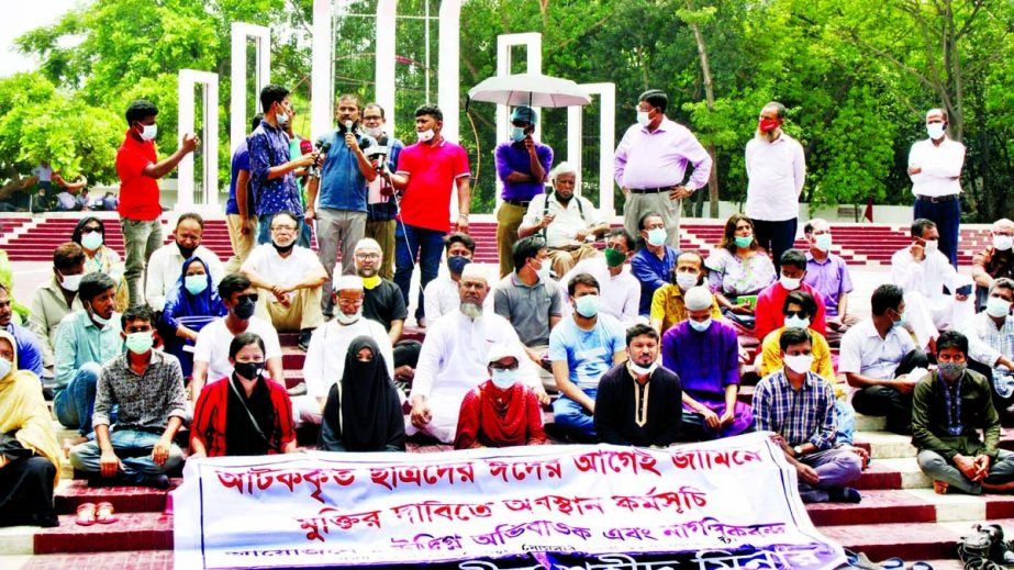 Anxious guardians and citizens stage a sit-in at the Central Shaheed Minar in the city on Monday demanding release of detained students in bail before Eid