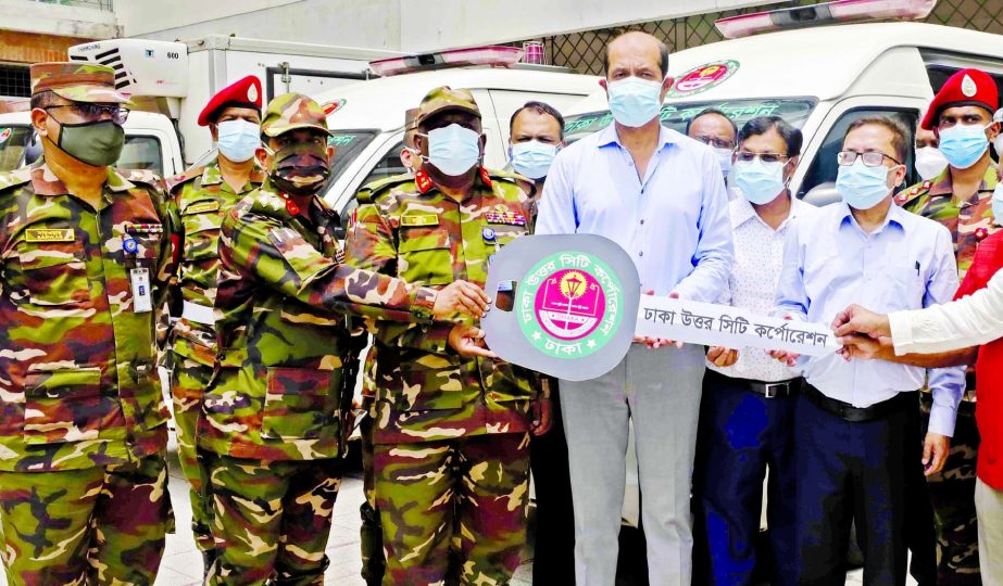 Dhaka North City Corporation Mayor Atiqul Islam hands over key of 2 ambulances and 1 corpse bearing freezing vehicle for DNCC Dedicated Covid-19 Hospital on Monday.
