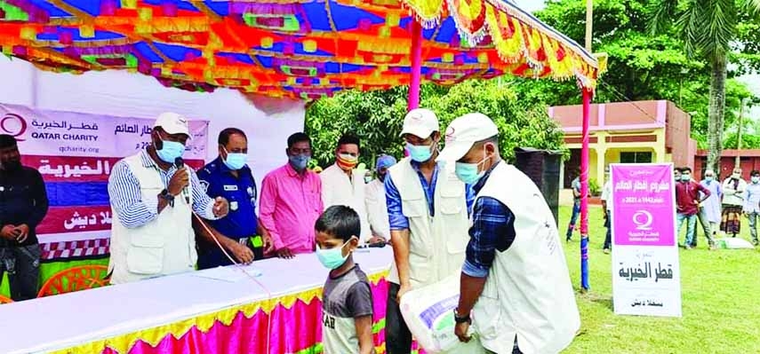 Qatar Charity, an International NGO, distributes food items among more than 600 orphans at Gangachara of Rangpur district on Sunday. The food items include 25 kg rice, 5 kg soybean meal, 2 kg sugar, 3 kg pulses, 1 kg salt, 3 kg gram, 2 kg onion and half a