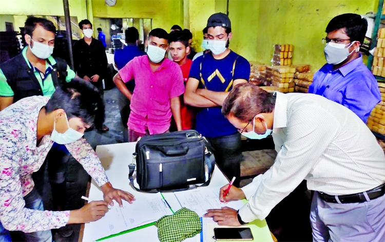 Mobile Court of RAB-10 imposes fine upon some establishments for producing and selling adulterated food conducting raid at Keraniganj area on Friday.