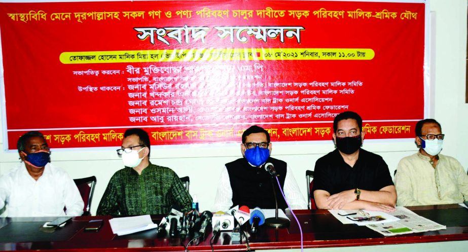 President of Bangladesh Sarak Paribahan Sramik Federation Shajahan Khan, MP speaks at a prèss conference organised by the samity at the Jatiya Press Club on Saturday with a call to run mass transport for long route following health guidelines.