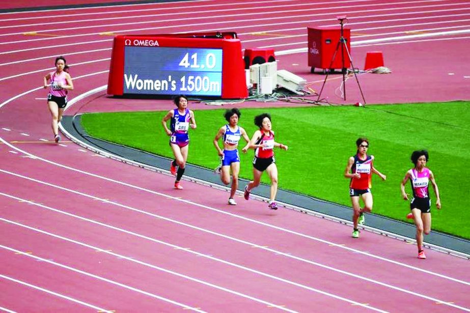Athletes compete in a heat of the women's 1500m T20 category during a para-athletics test event for the 2020 Tokyo Olympics at the National Stadium in Tokyo on Tuesday.