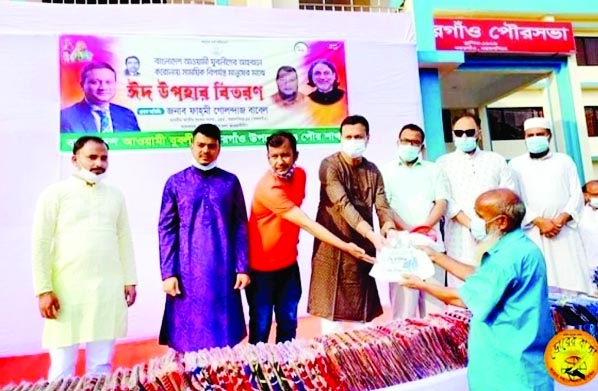 Mymensingh, 10, (Gafargaon) Constituency Fahmi Golandaj Babel, MP distributes Eid items among the poor of his Constituency in an occasion organized by Jubo League recently.