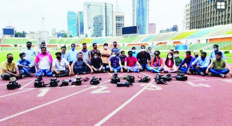 The sports journalists stage a sit-in programme at the Bangabandhu National Stadium on Tuesday demanding immediate release of journalist Rozina Islam of Prothom Alo.