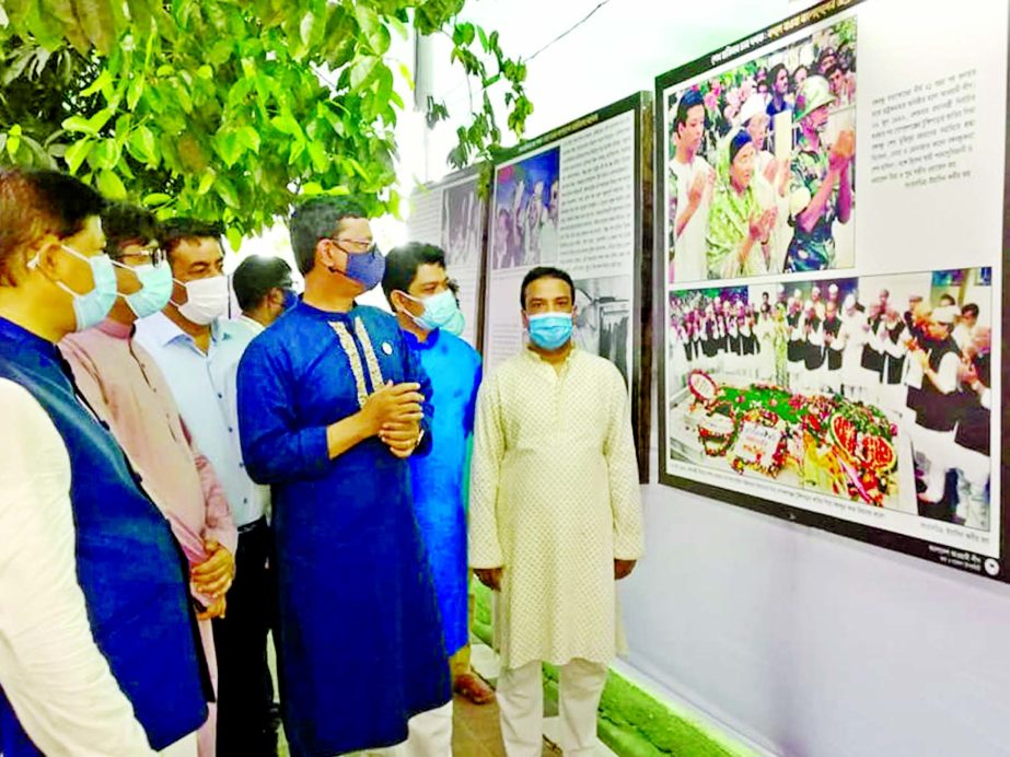 State Minister for Shipping Khalid Mahmud Chowdhury visits the photo gallery organised on the occasion of Sheikh Hasina's Homecoming Day by Information and Research Sub-Committee of Bangladesh Awami League at 32, Dhanmondi in the city on Tuesday.