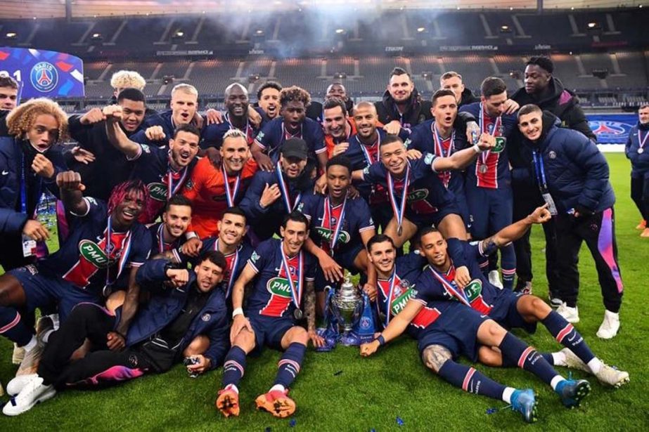 Paris Saint-Germain's players celebrate with the trophy after winning the French Cup final against Monaco at the Stade de France stadium, in Saint-Denis, on the outskirts of Paris on Wednesday.