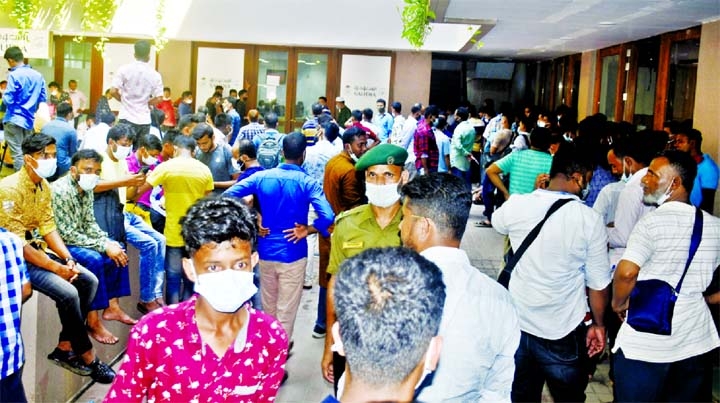 Saudi-bound expatriates throng Hotel Sonargaon Saudi Airlines Office for tickets acquisition and re-confirm on Friday.