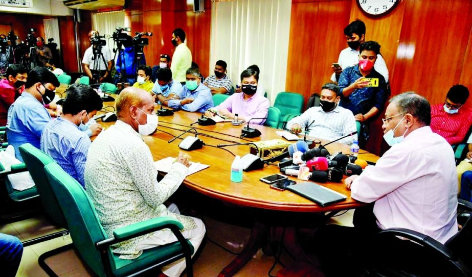 Information and Broadcasting Minister Dr. Hasan Mahmud exchanges views with journalists at the seminar room of the ministry on Monday.