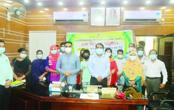 Md. Ikramul Haque Titu, Mayor, Mymensingh City Corporation distributes education stipends among the underprivileged students at a formal ceremony in his office room on Monday.