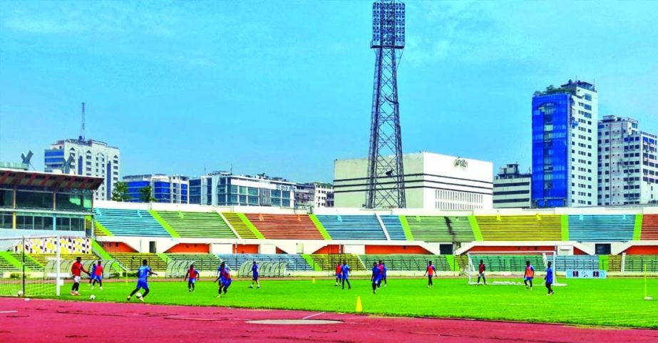 Bangladesh preliminary football squad during their practice session at the Bangabandhu National Stadium on Monday.