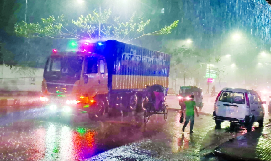 In a sigh of relief, thunder shower lashed the capital and parts of the country on Monday evening. This photo was taken from Ittefaq Bhaban Intersection at Tikatuli in the city.