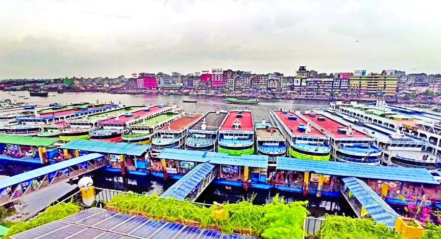 Water transports remain anchored at Sadarghat Launch Terminal due to cyclone 'Yaas' on Tuesday.
