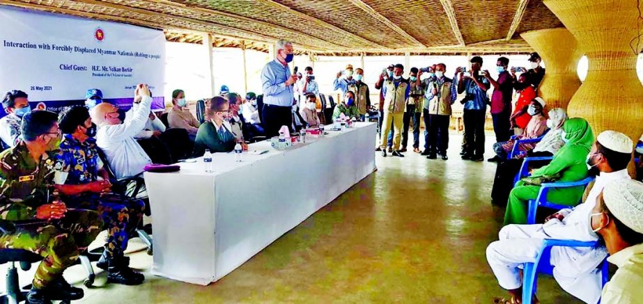 UNGA President Volkan Bozkir talks to Rohingya representatives at Ukhiya Rohingya Camp in Cox's Bazar on Wednesday.