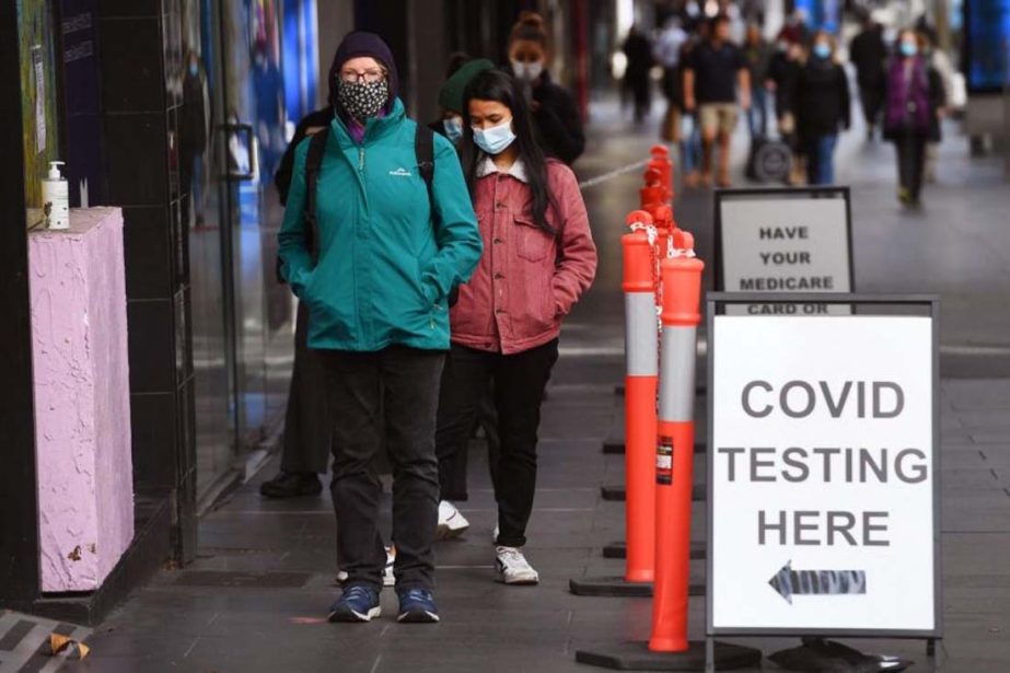 People in Melbourne, Australia lining up to get Covid-19 tests on Wednesday. With 15 cases linked to an Australian football match so far, authorities have warned that another lockdown could take effect.