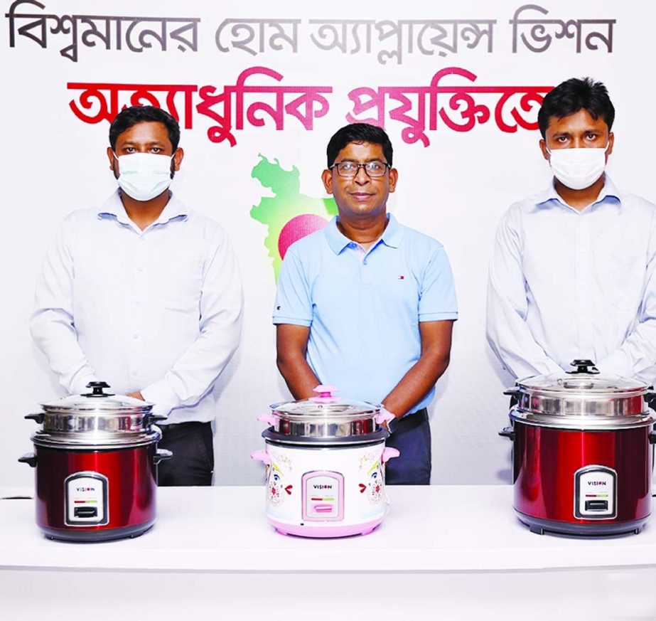 RN Paul, Managing Director of RFL Group, poses for photograph after inaugurating the manufacturing and marketing activities of the five new models of the rice cooker at PRAN Industrial Park in Narsingdi on Thursday. Masudur Rahman, Noor Mohammad Mamun, Se