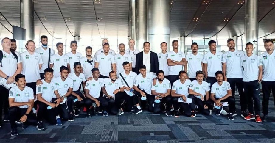 Members of Bangladesh Football team pose for a photo session at Doha, the capital city of Qatar on Friday.