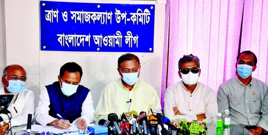 Information and Broadcasting Minister Dr. Hasan Mahmud speaks at a ceremony after giving Covid-19 protective equipment to Chapainawabganj district Awami League leaders at Dhanmondi party office in the city on Friday.