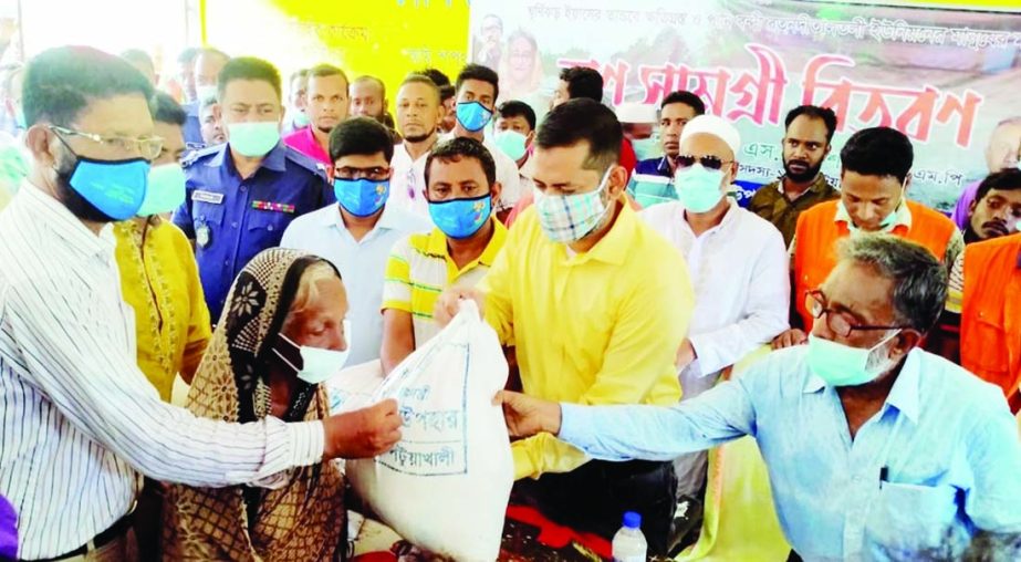 SM Shahzada, MP distributes relief goods among the victims of Iaas cyclone at Golachipa, Patuakhali on Friday.