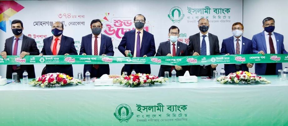 Mohammed Monirul Moula, Managing Director and CEO of Islami Bank Bangladesh Limited, inaugurating the bank's 374th Branch at Mohongonj in Netrokona on Sunday. Muhammad Qaisar Ali, Md. Omar Faruk Khan, AMDs, Md. Mosharraf Hossain, DMD, Md. Mahboob Alam, S