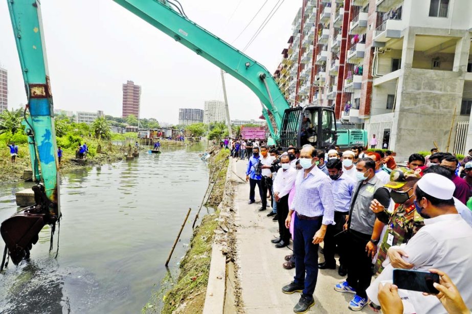 In presence of DNCC Mayor Atiqul Islam, eviction of illegal occupation and cleaning of waste of Baunia canal being conducted on Wednesday.