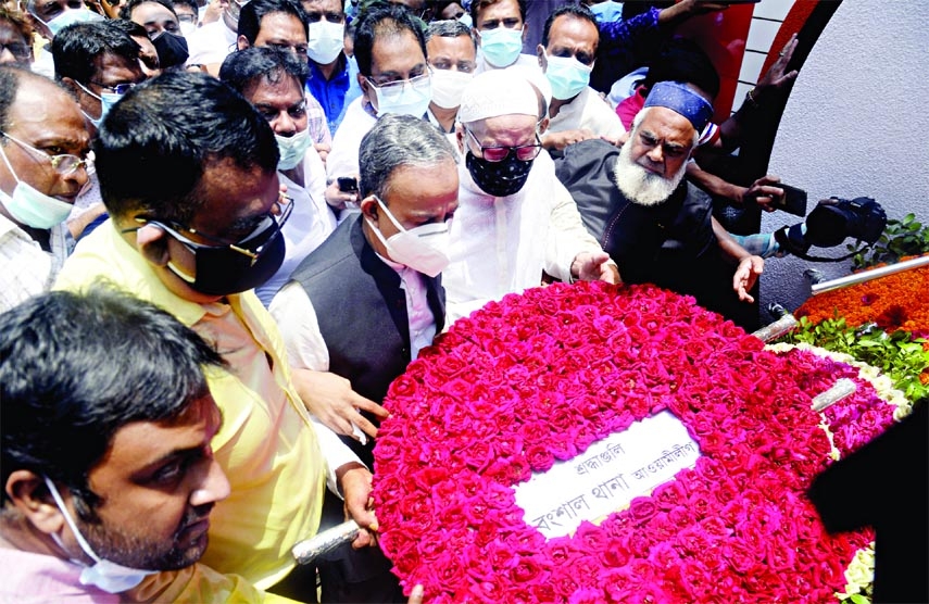 President and General Secretary of Dhaka Mahanagar Dakshin Awami League Abu Ahmed Mannafi and Humayun Kabir respectively, among others, pay floral tributes at the memorial plaque on Thursday marking the 10th anniversary of Nimtali Tragedy.