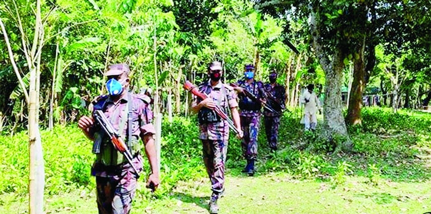 Members of Border guard Bangladesh patrol in Benapole port area on Wednesday to prevent border area from corona infection.