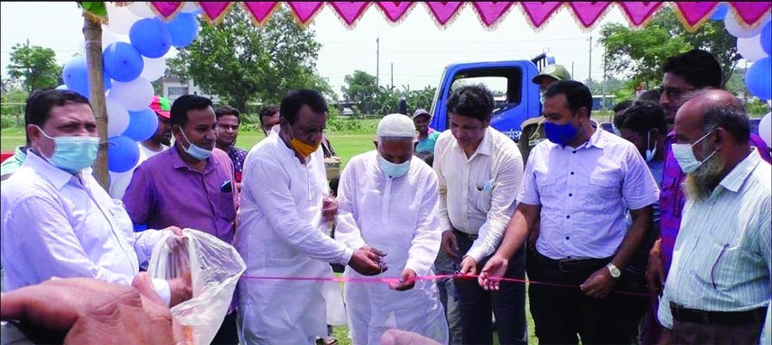 Ishwardi Upazila Chairman Naib Ali Biswas cuts ribbon for opening of the Animal Resources Exhibition at the Alhaj Textile Mills School ground in Ishwardi on Saturday.