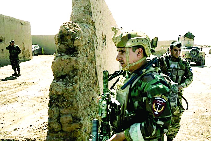 Afghan special forces on May 25 arrive at the Bolan Qal a army outpost near the city of Lashkar Gah, where the fight against the Taliban has intensified.