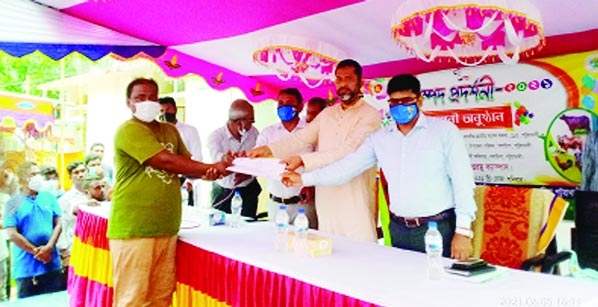 SM Shahzada, MP of Patuakhali -03 distributes prizes among the winners of Livestock Exhibition ceremony held in Galachipa on Saturday.