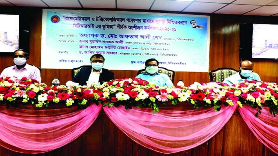 Chairman of BCSIR Prof Dr. Aftab Ali Shaikh speaks at a workshop on 'Biomedical & Texicological Research to Ensure Good Health' in its IFST auditorium in the city on Monday. Shawkat Ali, Member (Admin & Finance) of BCSIR and its Secretary Shah Abdul Tar