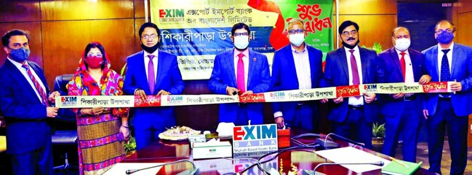 Dr. Mohammed Haider Ali Miah, Managing Director and CEO of Exim Bank Limited, inaugurating the bank's Shikaripara sub branch at Nawabganj in Dhaka on Sunday. Md. Feroz Hossain, AMD, Md. Humayun Kabir, DMD and other senior officials of the bank were prese