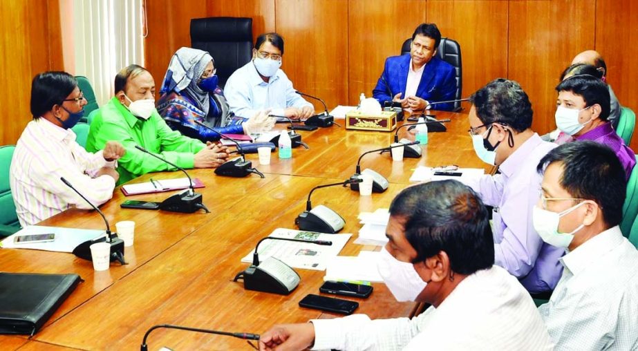 Information and Broadcasting Secretary Mokbul Hossain presides over the meeting with the heads of different offices under the ministry on its progress at the seminar room of the ministry on Tuesday.