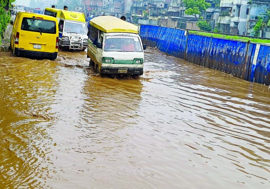 Legunas struggle to ply on a waterlogged road at Dayaganj area in the capital on Tuesday due to poor drainage system.