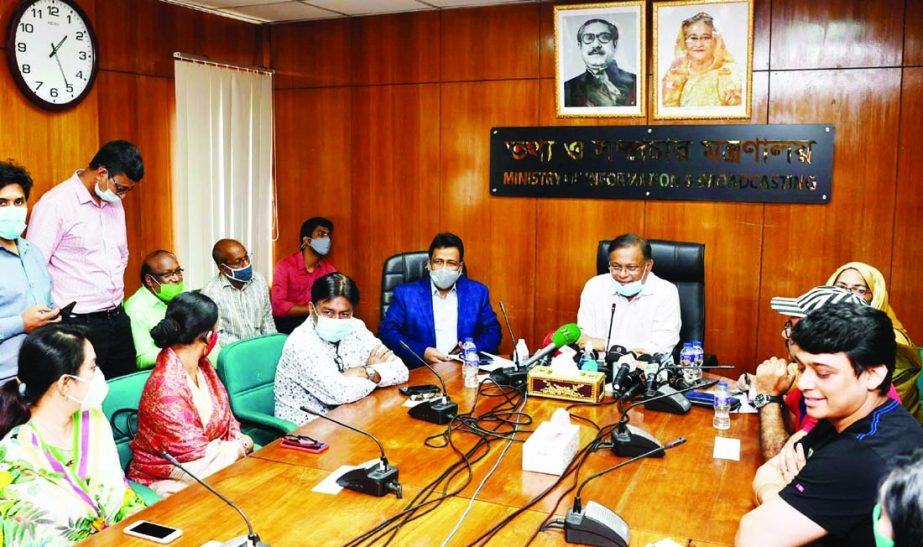Information and Broadcasting Minister Dr. Hasan Mahmud exchanges views with the leaders of 'Avinoy Shilpi Sangha' and 'Bangladesh Chalachchitra Shilpi Samity' at the seminar room of the ministry on Thursday.