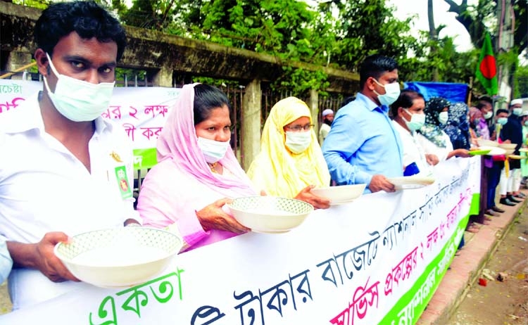 Bangladesh National Service Families stage a demonstration in the city on Friday to realize its various demands including nationalization to their jobs.