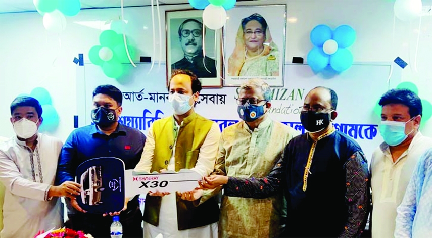 Deputy Education Minister Barrister Mahibul Hasan Chowdhury Nawfel, MP gets the key of an ambulance donated by Sufi Mizan Foundation to 250-bed Chittagong General Hospital in Anderkilla on Friday.