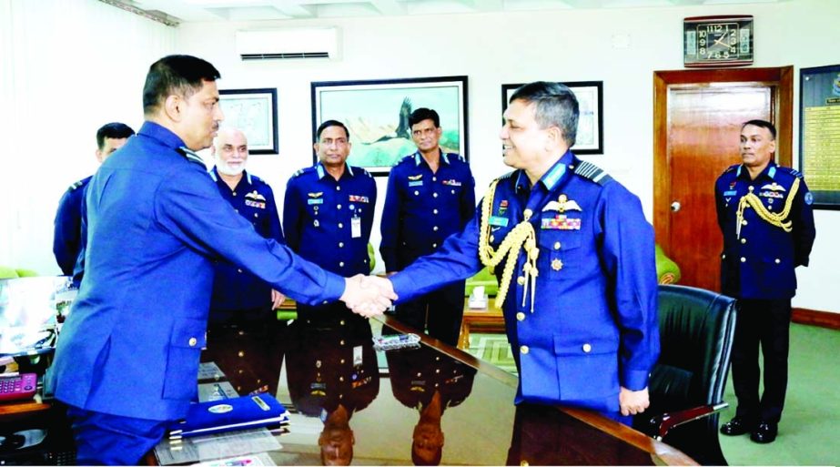 Outgoing Air Chief Air Chief Marshal Masihuzzaman Serniabat shaking hands with the newly appointed Air Chief Air Vice Marshal Sheikh Abdul Hannan on Saturday after handing over charge. ISPR photo