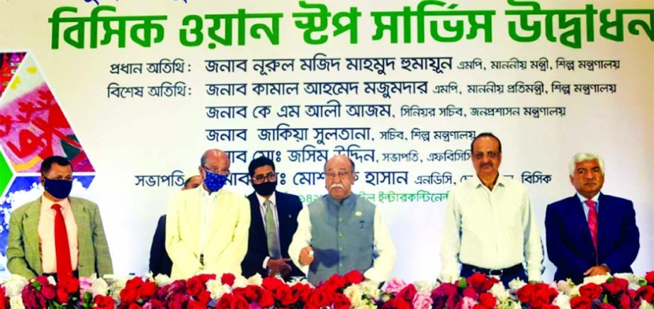 Industries Minister Nurul Majid Mahmud Humayun, State Minister Kamal Ahmed Majumder and others during the launching of BSCIC One-Stop Service at Hotel Intercontinental in Dhaka on Sunday.